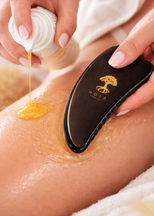 Gua sha massage with golden oil (1)