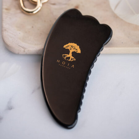 Gua Sha massaažikivi kehale